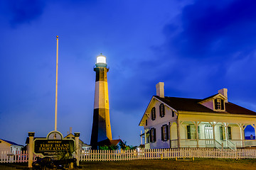 Image showing tybee island beach lighthouse with thunder and lightning