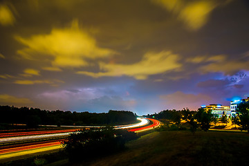 Image showing thunder and lightning storm weather during evening traffic commu