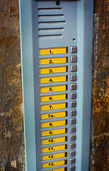 Image showing A panel of doorbells