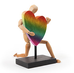 Image showing Wooden mannequin with a big heart