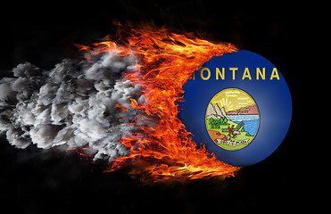 Image showing Flag with a trail of fire and smoke - Montana