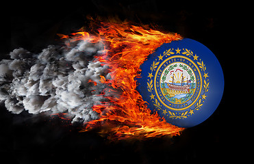 Image showing Flag with a trail of fire and smoke - New Hampshire