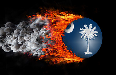 Image showing Flag with a trail of fire and smoke - South Carolina