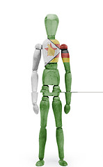 Image showing Wood figure mannequin with flag bodypaint - Zimbabwe