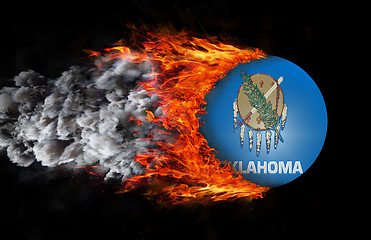 Image showing Flag with a trail of fire and smoke - Oklahoma