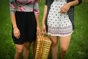 Image showing Two girls getting ready for a picnic