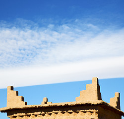 Image showing brown old  construction in africa morocco and red leather near t