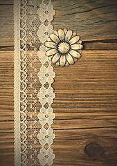 Image showing vintage button and lace tape