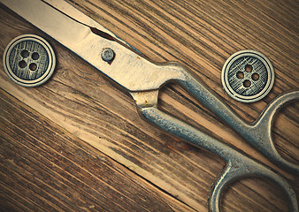 Image showing vintage buttons and a dressmaker scissors