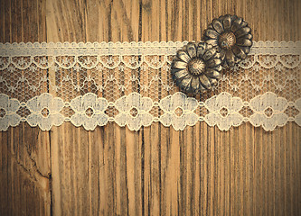 Image showing vintage button and lace tape