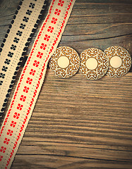 Image showing vintage buttons and antique band with embroidered ornaments