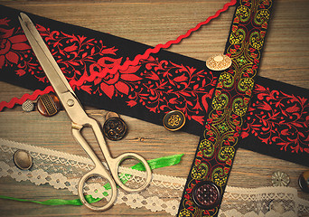 Image showing vintage scissors, ribbons and old buttons