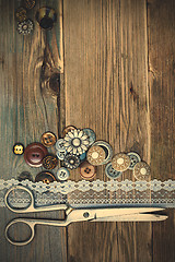 Image showing vintage buttons, lace, and a dressmaker scissors