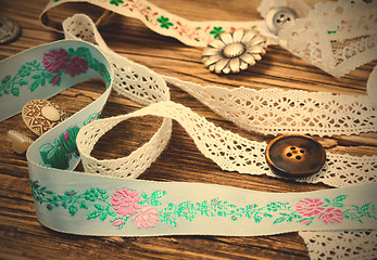 Image showing ribbon, lace, ribbons and buttons