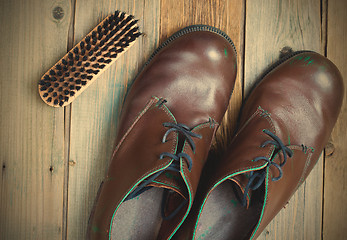 Image showing vintage boots brush and shoe polish