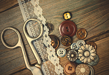 Image showing vintage buttons, lace, and a dressmaker scissors