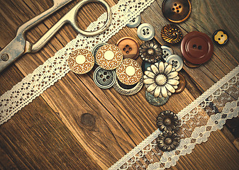 Image showing vintage buttons, lace, and a dressmaker scissors