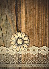 Image showing vintage button and lace tape