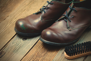 Image showing vintage boots brush and shoe polish