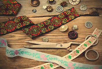 Image showing vintage buttons, lace, and a dressmaker scissors