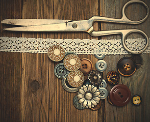 Image showing antique buttons, lace and a tailor scissors