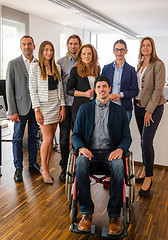 Image showing Portrait Of Business Team With Wheelchair