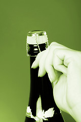 Image showing Opening champagne bottle