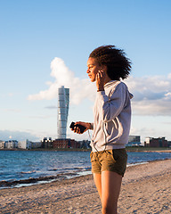 Image showing smiling female on beach