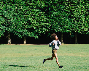 Image showing female running in park