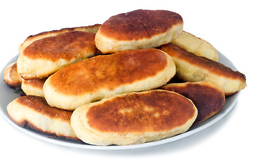 Image showing Cakes on a ceramic dish on a white background.