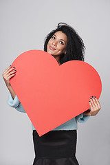 Image showing Girl holding big red heart shape