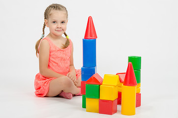 Image showing Four-year girl playing with blocks