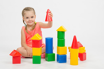 Image showing four-year child is having fun playing with blocks