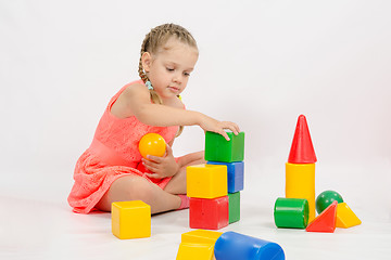 Image showing Girl playing in developing a set of dice