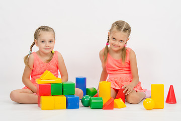 Image showing Sisters playing with blocks