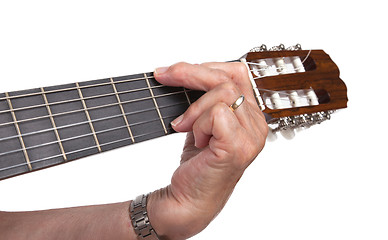 Image showing Old hand and guitar isolated