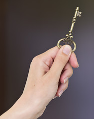 Image showing hand with key