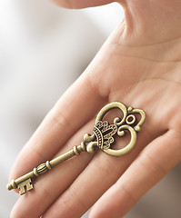 Image showing hand with key