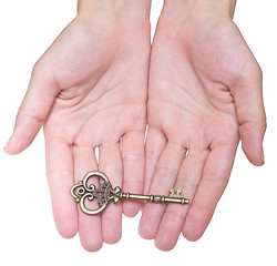 Image showing hands with key