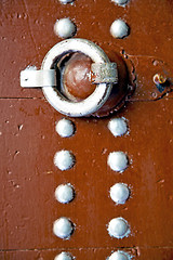 Image showing brown  morocco in  home and rusty safe padlock 