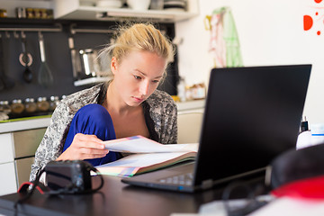 Image showing Female freelancer working from home.