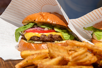 Image showing burgers and fries on a tray