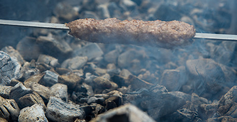 Image showing cooking meat on the coals