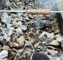 Image showing cooking meat on the coals