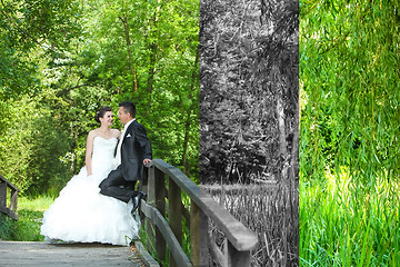 Image showing Bride and groom posing abstract