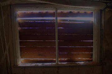 Image showing boarded up window in the house