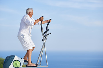 Image showing healthy senior man working out