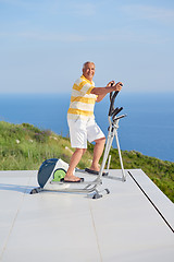 Image showing healthy senior man working out