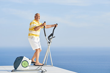 Image showing healthy senior man working out