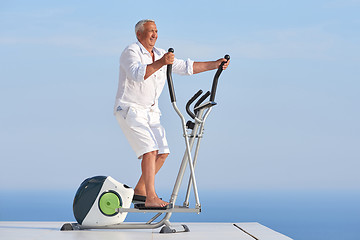 Image showing healthy senior man working out